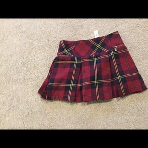 Selling a red plaid skirt